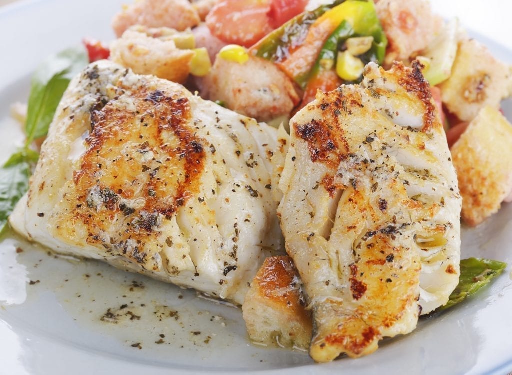 grilled Mahi Mahi with fresh vegetables as a low-calorie dinner option to help you lose weight