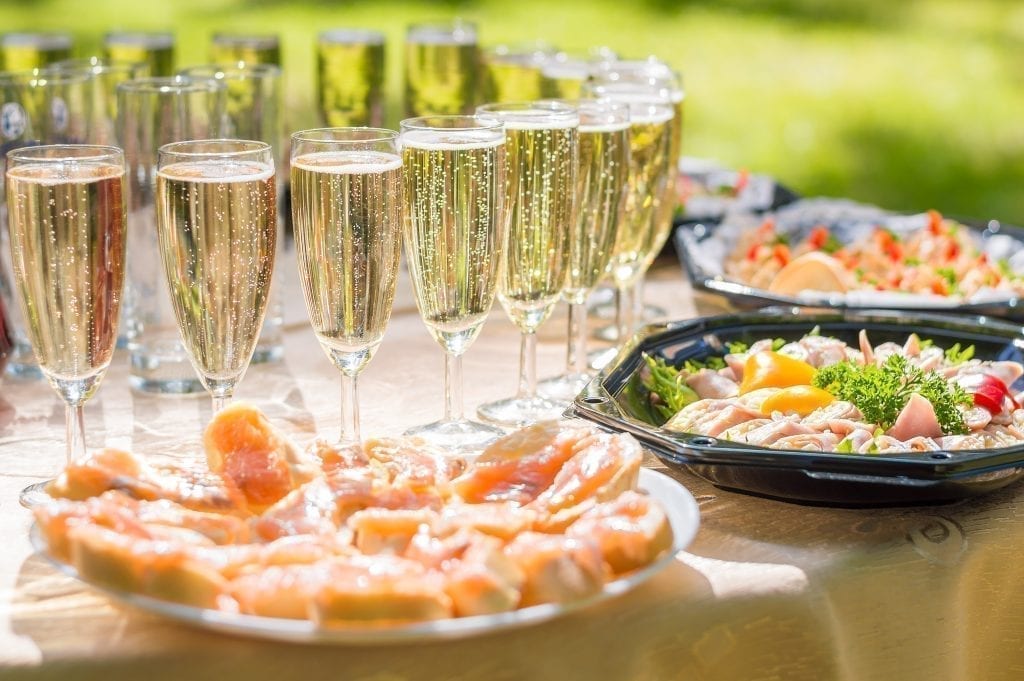 Wedding party buffet with champagne, canape, sandwiches