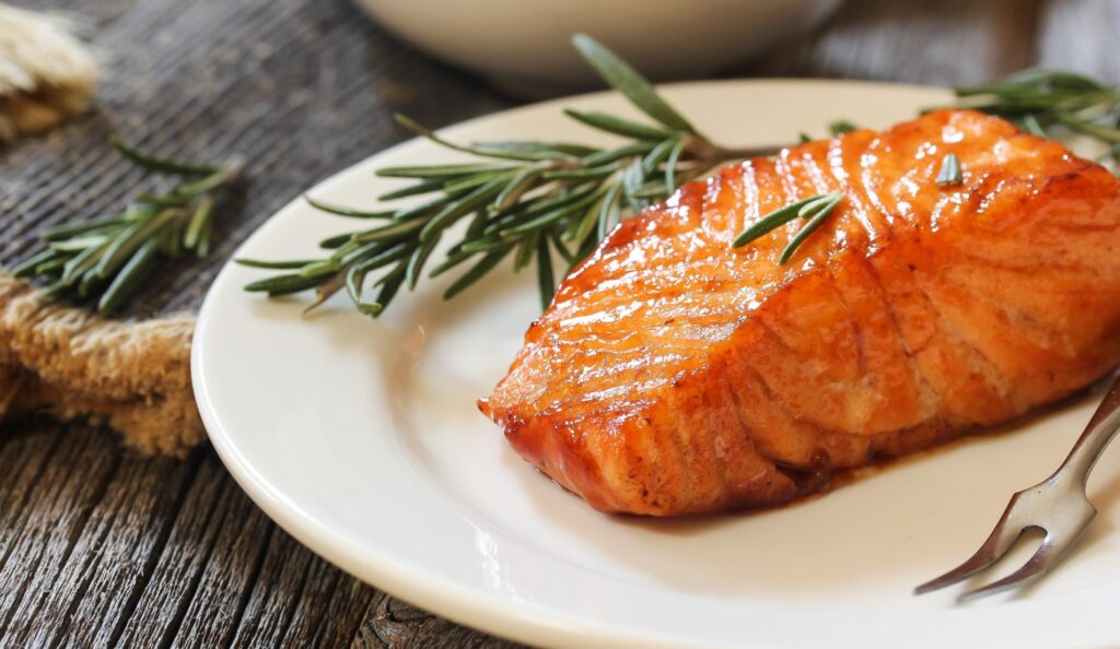 Pan fried salmon with Rosemary garnish